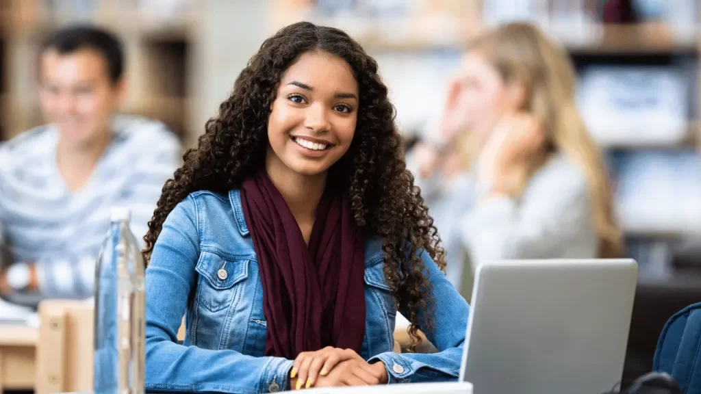 Student smiling - can f1 students work lsi - Language Systems International Student smiling