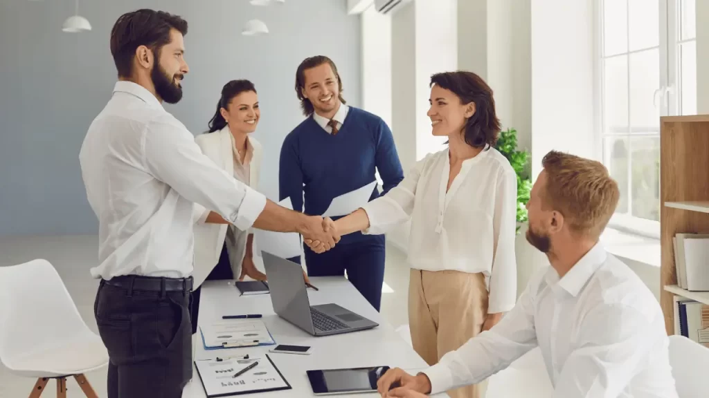 Man and woman on business environment compliment each other