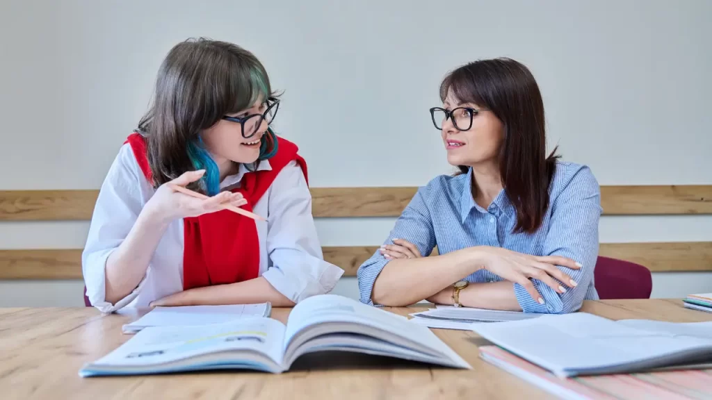 Two students talking to each other