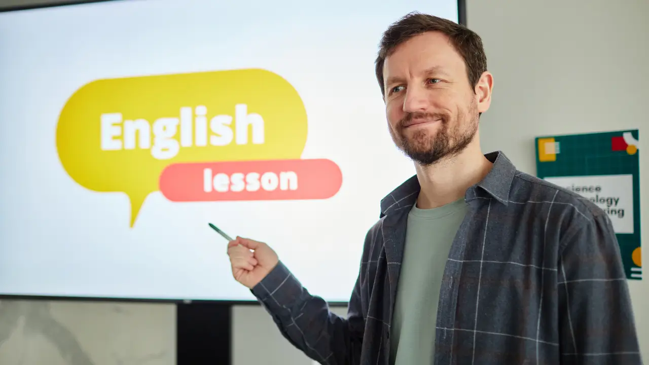Teacher in front of a TV