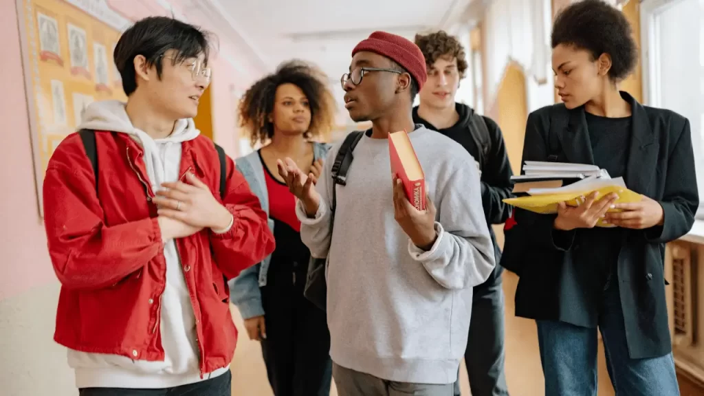 Students talking about slang words - img slang words lsi - Language Systems International Students talking about slang words