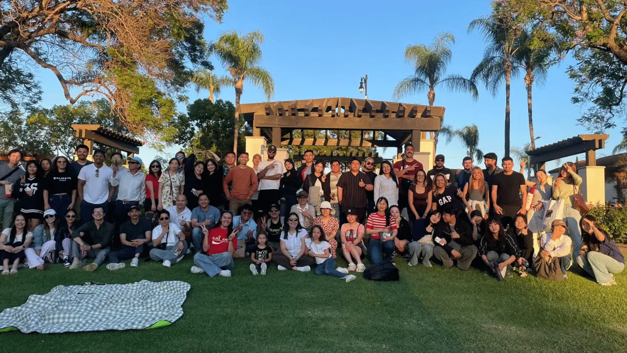 Students smiling in the summer evening