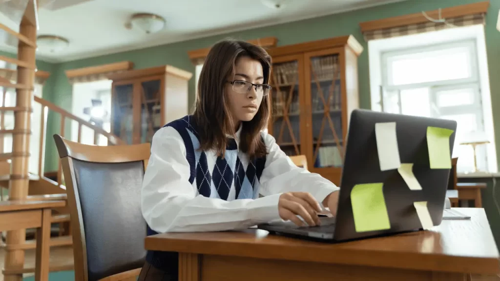 Woman writing an essay