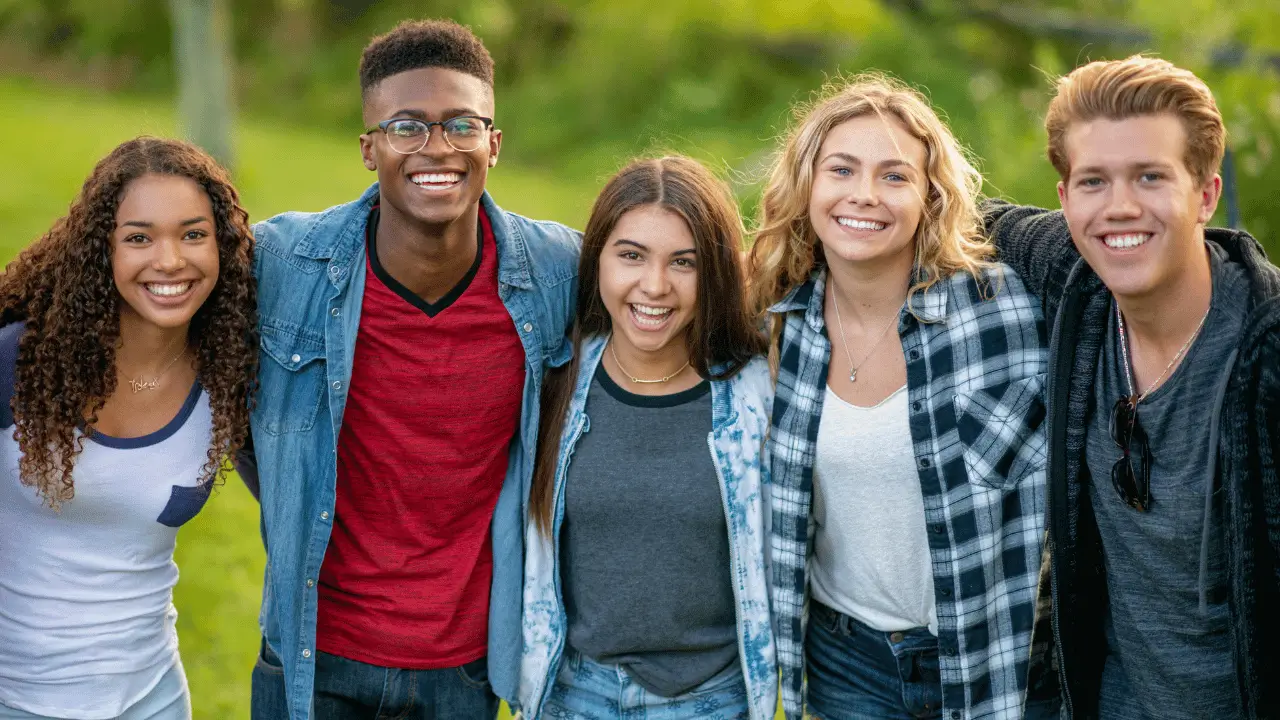 Teens smiling together